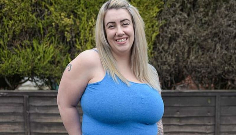 health issues shared by a woman who has extra sized breasts