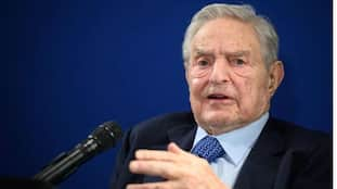 BJP accused Sonia gandhi close to George Soros who said Kashmir is not part of India