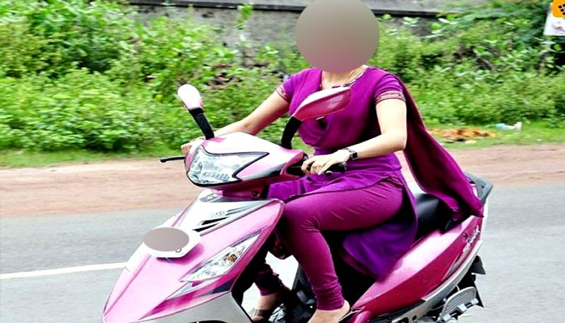 Girl complaint unable to ride scooty because of SEX on number plate