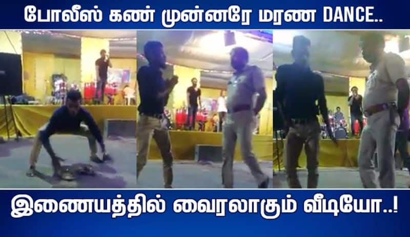 a boy dance in front of the police