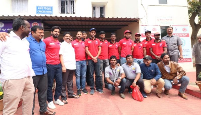 World Cancer Day Indian hockey players meet cancer patients Bhubaneswar hospital