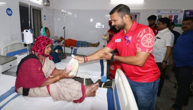 World Cancer Day Indian hockey players meet cancer patients Bhubaneswar hospital