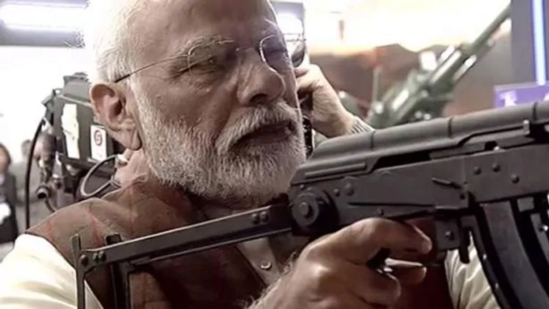 PM Modi Seen Aiming Assault Rifle At Defence Expo 2020 In Luknow