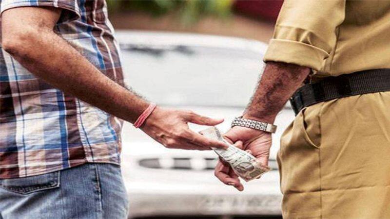 bribe case gubbi PSI Jnanmurthy  suspended snr