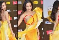 Malaika Arora suffers oops moment in this one-shoulder thigh-slit satin gown