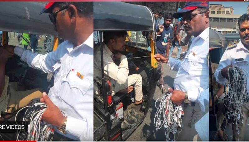 Police collect auto drivers headphones and set them on fire mumbai