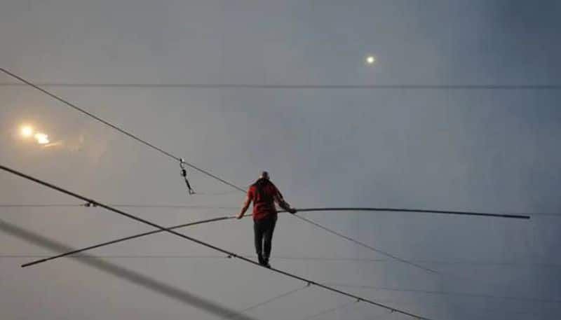 man Walks On Wire Across Active Volcano