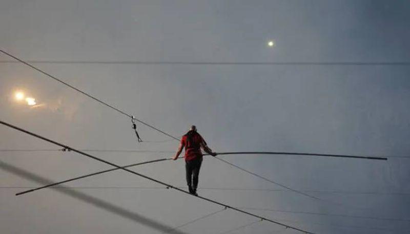 man Walks On Wire Across Active Volcano