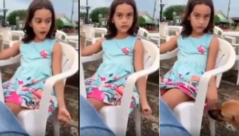 girl share food for stray dog video goes viral in social media