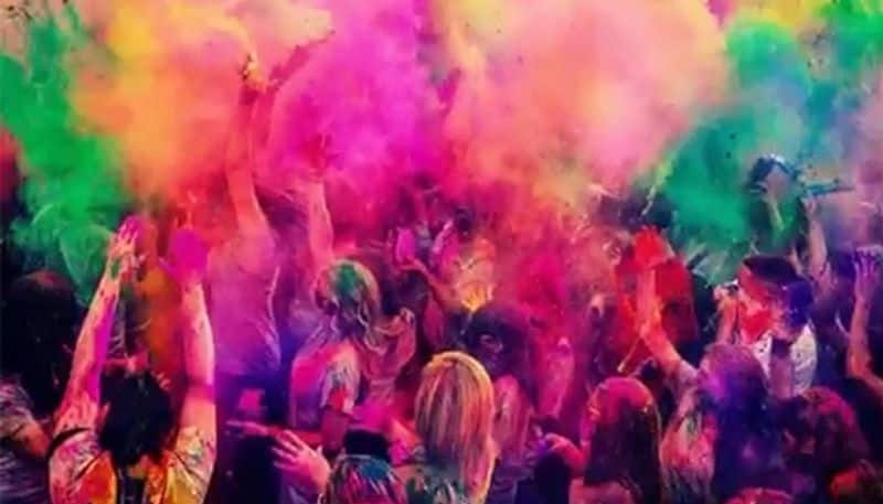 Photos of Foreign tourists Holi Celebration at Hampi in Ballari District