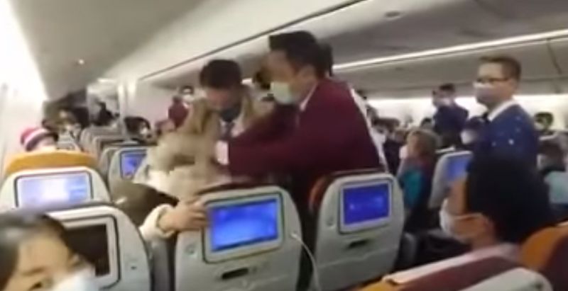 Chines passenger coughing on cabin crew member of Thai airline