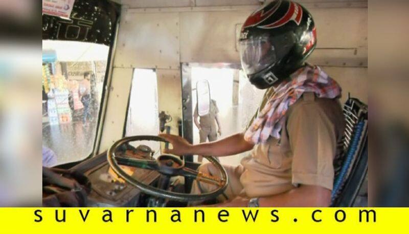 Madikeri man drives bus wearing helmet