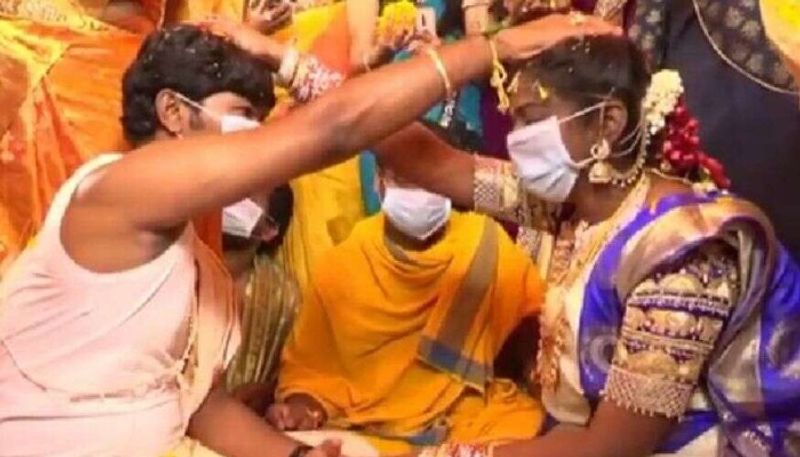 couple get married in masks in andhra pradesh amid coronavirus