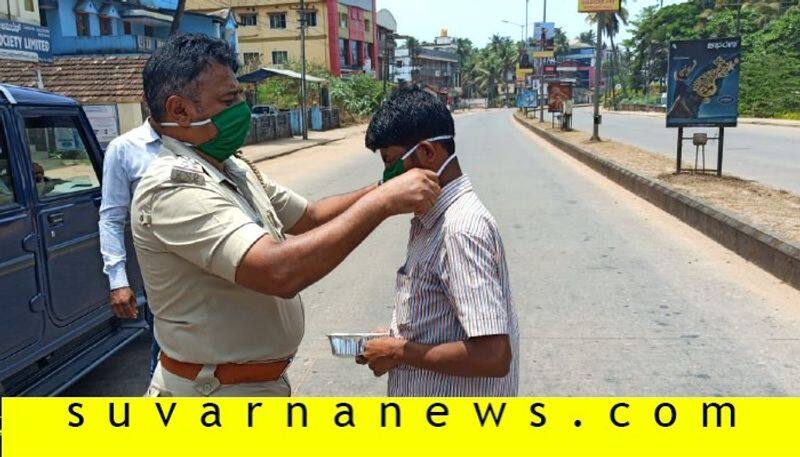 Police distributes masks in udupi instead using lathi