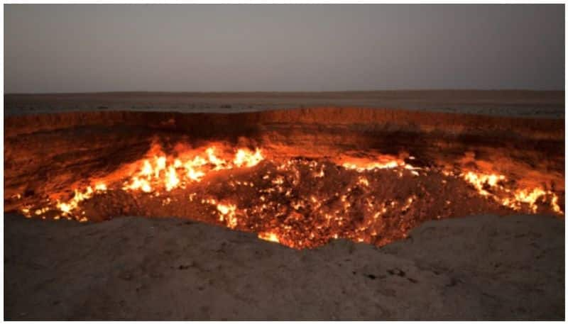 scientists wonders on Darvaza gas crater which has been burning for more than 50 years