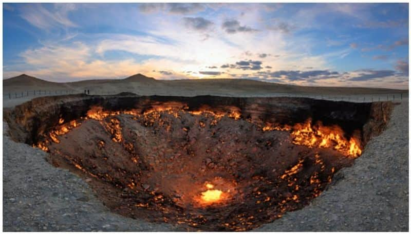 scientists wonders on Darvaza gas crater which has been burning for more than 50 years