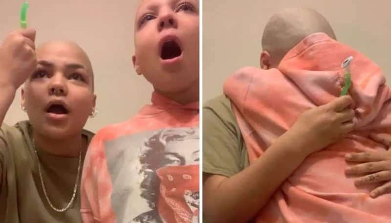 girl shave head and eyebrows for her cancer patient sister