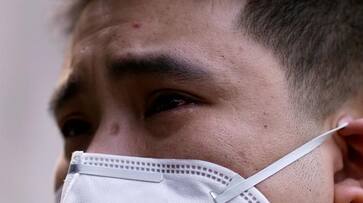 China again reports coronavirus, nearly 100 cases in single day