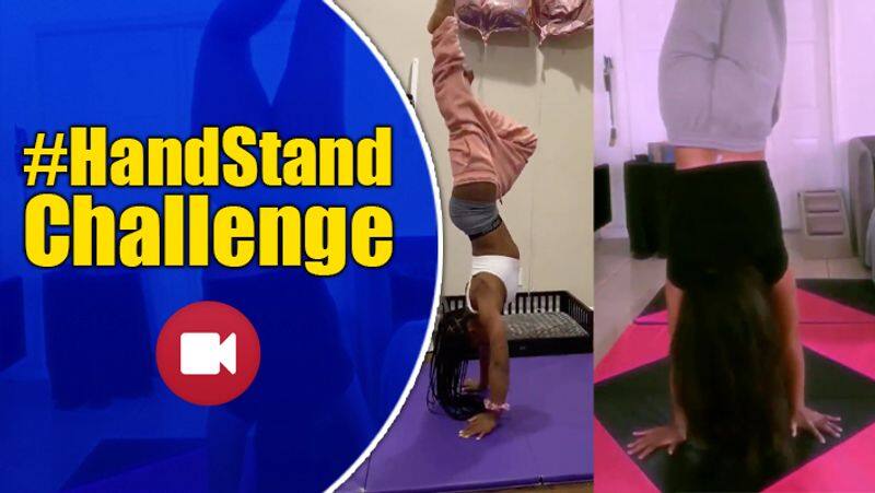 Olympic gymnast Simone Biles takes the handstand challenge and sets a gold standard