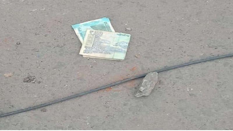 No One Dares To Pick Currency Notes on Road this is all coronavirus affect