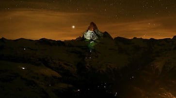 Coronavirus Indian tricolour projected on Switzerland Matterhorn mountain