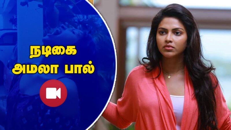 Actress Amala Paul Dancing in Rain with her pets