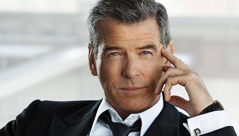 Pierce Brosnan pleads guilty to walking off trail at Yellowstone hot springs must pay fine vvk