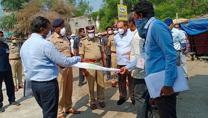 Telangana Chief Secretaray Somesh kumar and DGP Mahender Reddy inspect suryapet market