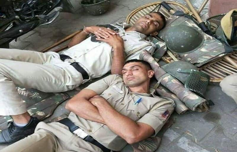 Cops sleeping on ground, pictures viral