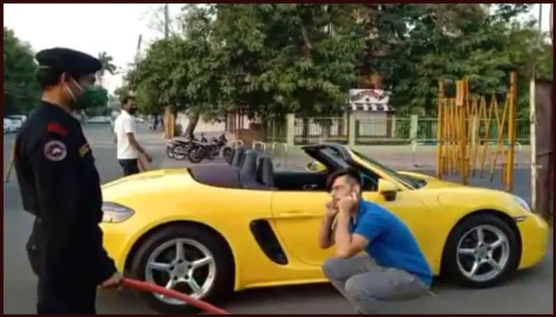 Man attempts joyride in high-end Porsche car during lockdown, gets punished with sit-ups