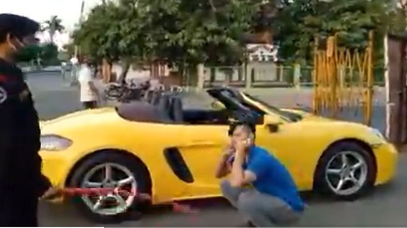 Porsche car owner finned sit ups by indore police for not wearing mask