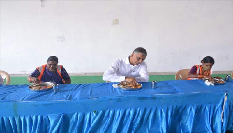 mayday special... harish rao tiffin with sanitary workers