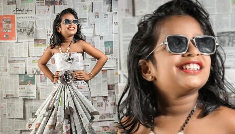 girl in a newspaper frock is viral now