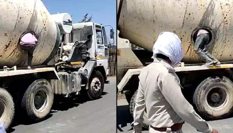 Men caught travelling in concrete mixer truck in MPs Indore