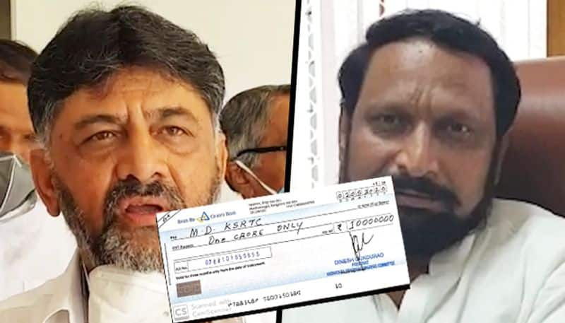 DK Shivakumar presents Rs 1 crore cheque; Karnataka transport minister calls it 'drama'