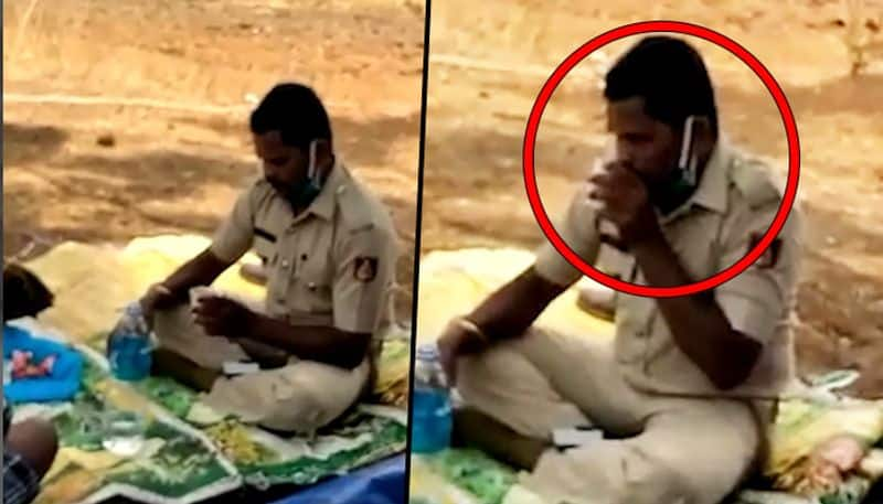 Cop on COVID duty joins liquor party in field