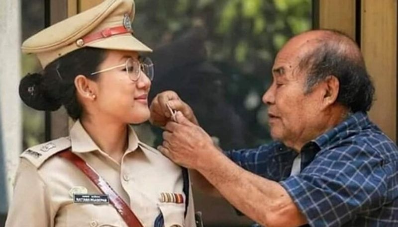 Viral A Proud Father Checks The Stars On Cop Daughter's Uniform