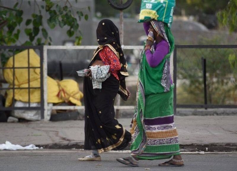 PTI photographer Atul Yadavs iconic image of migrant plight by Rajeev Somasekharan