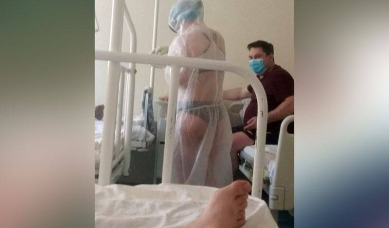 Russian half nude nurse dismissed by hospital admin