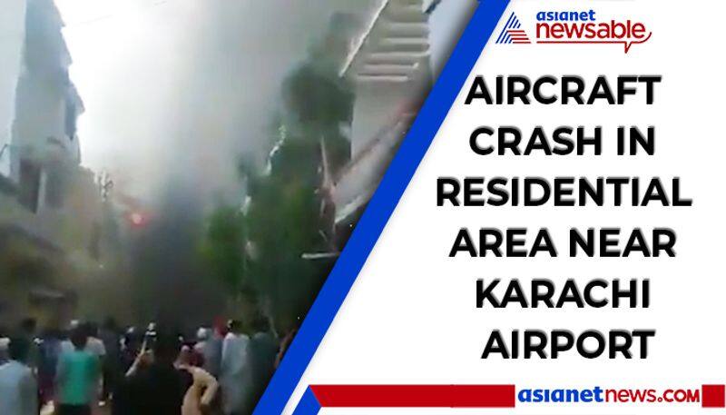 Pakistan PIA plane crashes in residential area in Karachi with over 90 passengers onboard