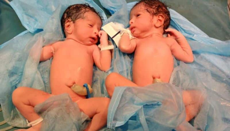 covid positive woman delivers twin girls at hyderabad