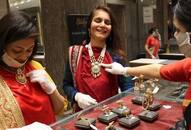 Gold silver shine, dollar slows down before Dhanteras