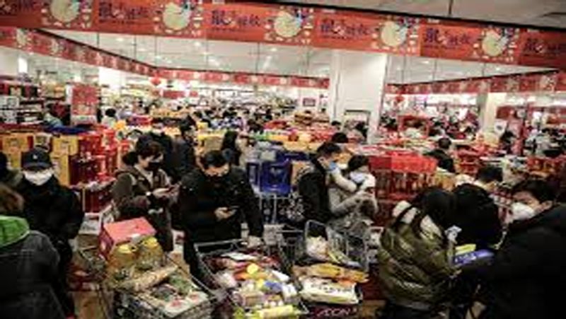 WHO experts visit Wuhan food market in search of coronavirus origin-dnm