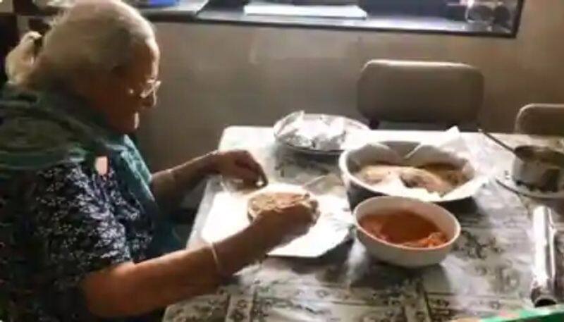 99 year old woman prepares food packets for migrants in mumbai