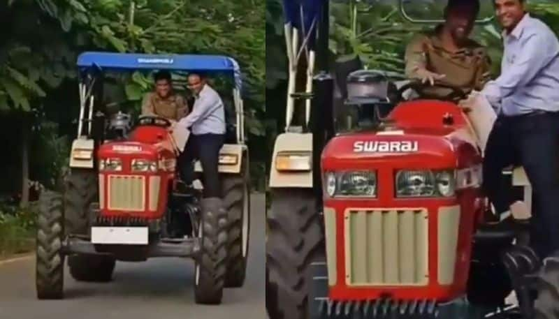 watch ms dhoni drives newest beast tractor