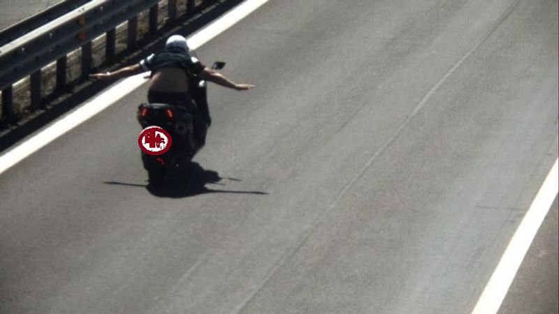 Man fined dangerous speeds on a highway with his hands off the handlebar Italy