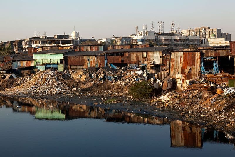 how did dharavi the biggest slum in asia bring covid 19 under control?