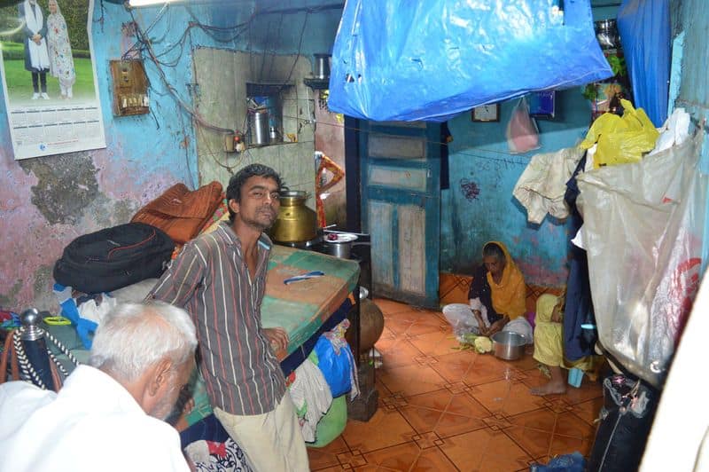 how did dharavi the biggest slum in asia bring covid 19 under control?