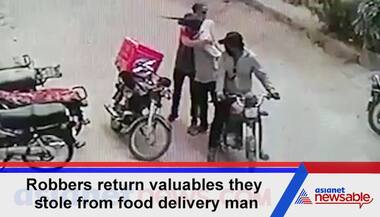 Watch: Robbers return valuables they stole from food delivery man; hug him