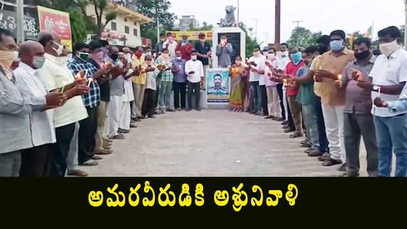 Huzurabad Police condolences with Candle to colonel santhosh babu